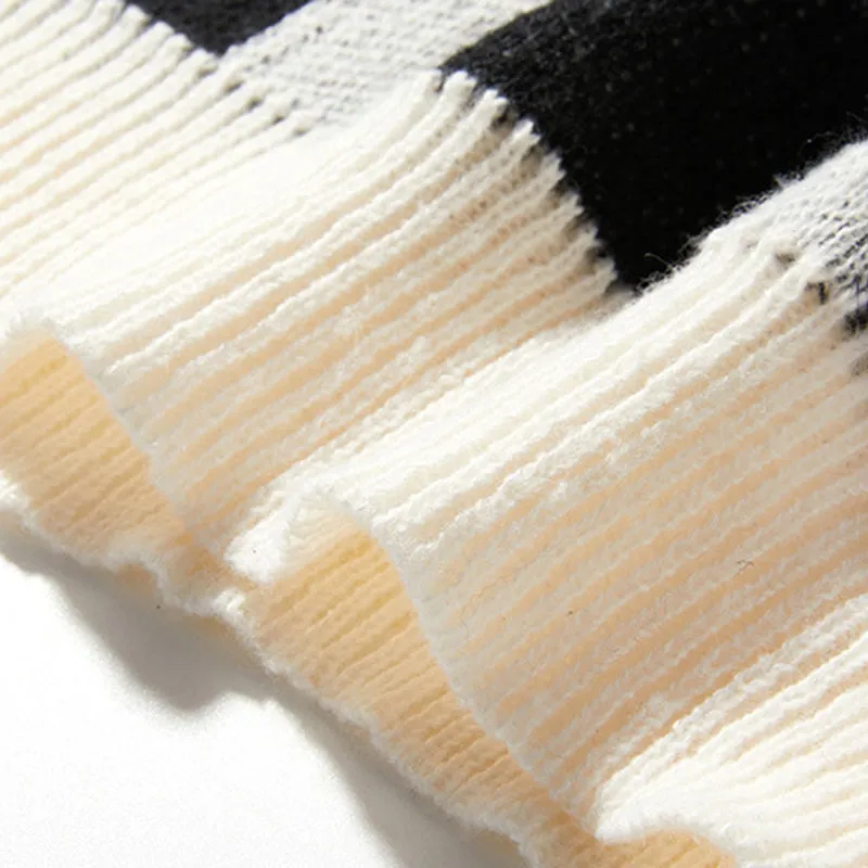Aule Colorblock Letter Sweater