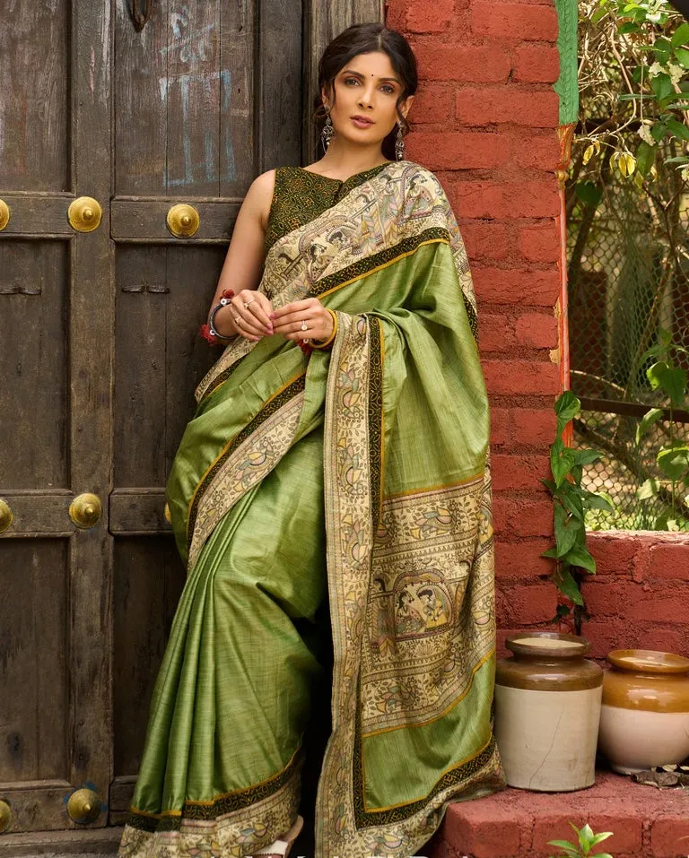 Pastel green semi-silk saree featuring Madhubani artwork on pallu and border