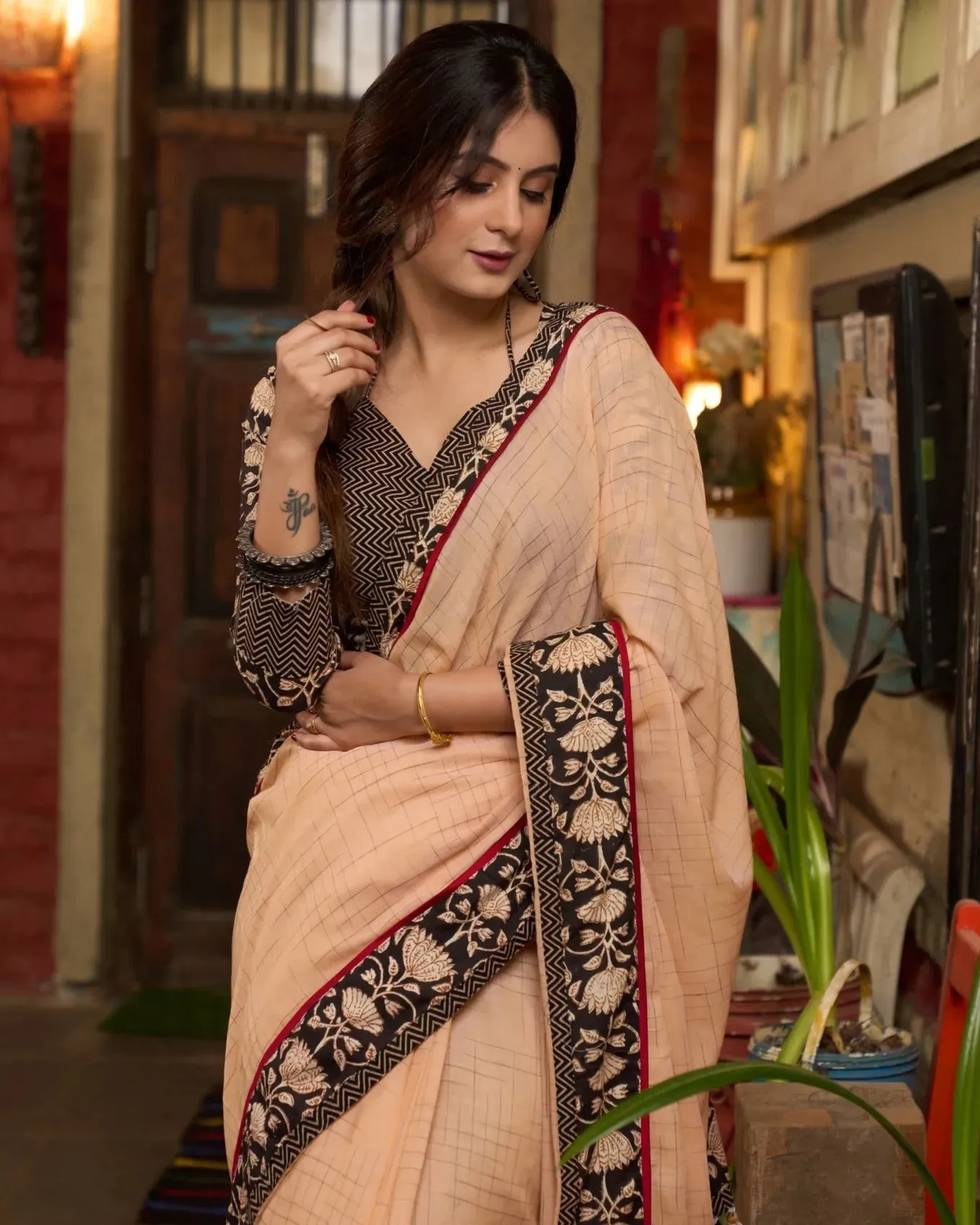 PASTEL PEACH COTTON SAREE WITH FLORAL BORDER