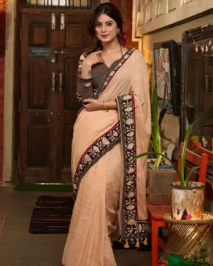PASTEL PEACH COTTON SAREE WITH FLORAL BORDER